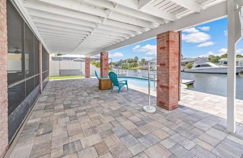 Spring Hill House | Waterfront home with pool and gameroom!