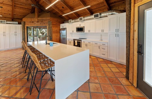 Longbeach Village House | Waterfront home with private beach, a private pool, and water activities! Moku