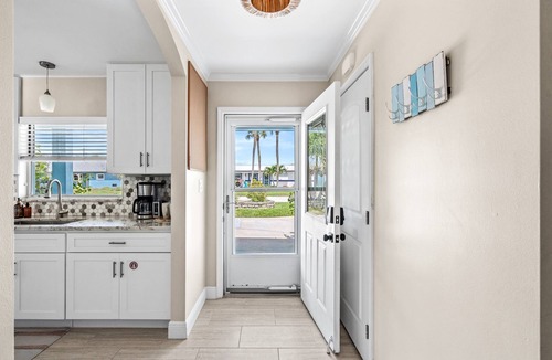 Convair Cove House | Waterfront Home with Dock | Heated Pool & Spa | 4.5 Blocks to Beach & Downtown