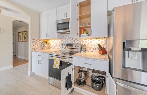 Convair Cove House | Waterfront Home with Dock | Heated Pool & Spa | 4.5 Blocks to Beach & Downtown