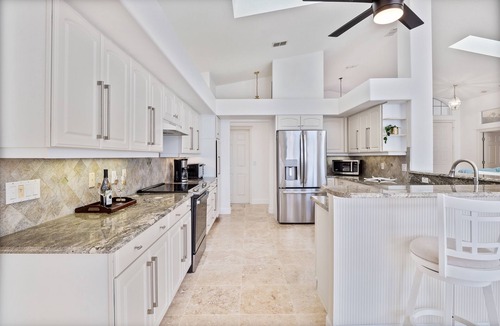 Palm Harbor House | Waterfront Home with Pool, Hot Tub, Dock, Game Room & 10 minutes to the Beach