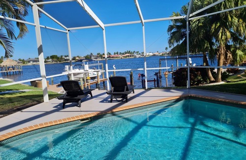 Eight Lakes House | Waterfront-House with Gulf access, heat. pool/spa, boat-dock, great neigborhood