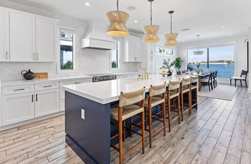 Bradenton Beach House | Waterfront Luxury Home with Pool and Spa, Golf Cart, and beach Bikes included!