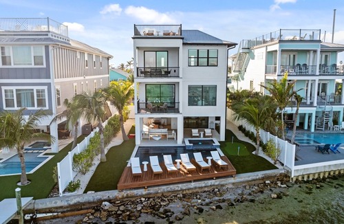 Bradenton Beach House | Waterfront Luxury Home with Pool and Spa, Golf Cart, and beach Bikes included!
