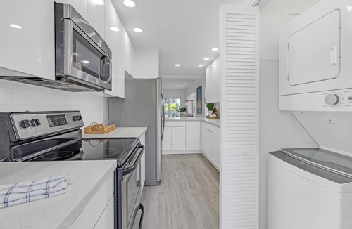 Boca Raton Apartment | Waterfront Oasis 2BR/2BA with Pool, Gym, Balcony & Parking