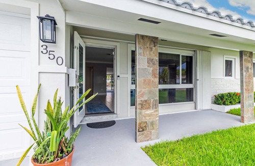 Garden Isles House | Waterfront Oasis – Private Heated Pool & Waterfall Hot Tub