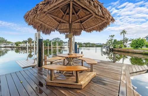 Harbor Hills House | Waterfront Oasis w/Pool, Spa, Boat & Jet ski Dock, Game Room & Outdoor Kitchen