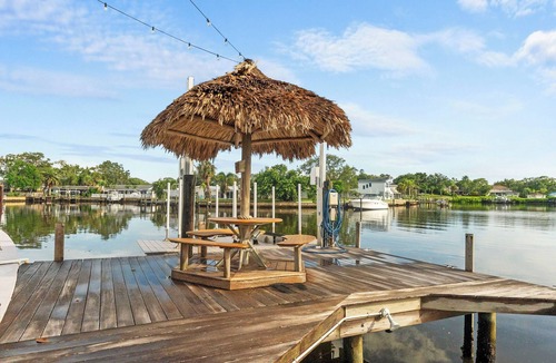 Harbor Hills House | Waterfront Oasis w/Pool, Spa, Boat & Jet ski Dock, Game Room & Outdoor Kitchen