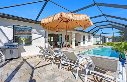Pelican House | Waterfront Paradise in Cape Coral, 4BR Salt Pool & Spa