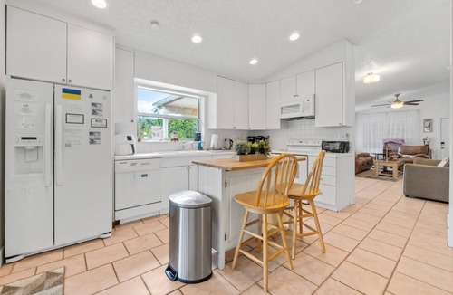 North Central Hollywood House | Waterfront Paradise with Tropical Palms, Swimming Pool & Hot Tub + Huge Backyard