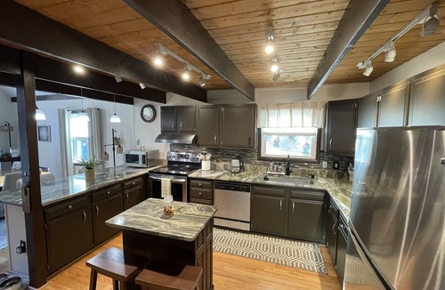 East Stroudsburg Ski Chalet | Waterfront Poconos retreat on Bushkill Creek w/firepit & wood pellet stove!