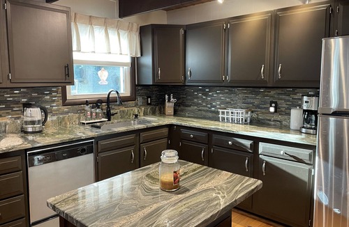 East Stroudsburg Ski Chalet | Waterfront Poconos retreat on Bushkill Creek w/firepit & wood pellet stove!