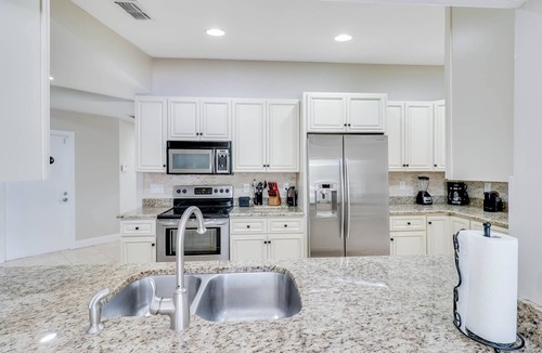Caloosahatchee Villa | Waterfront Pool Villa with Sail Boat access to the Gulf