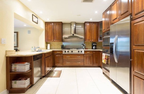 Sunset House | Waterfront Property with a resort style backyard and Heated Pool in Miami