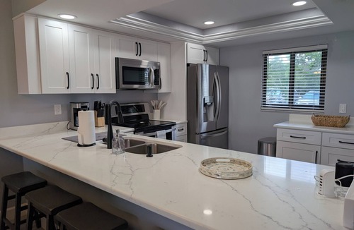North Fort Myers Condo | Waterfront views! Pool, Boat Dock, Tennis, Billiards & MORE. 90-day Minimum Stay