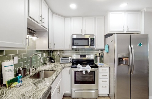 Palmetto Dunes Villa | Waterfront villa with resort amenities, beach access, open layout, AC, & W/D