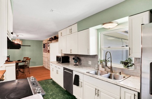 Putnam Hall House | Welcoming single-level home with private pool, hot tub, large yard, patio