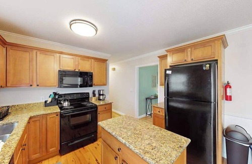 Mills River House | Well-located home in town with sunrise views, deck & great backyard