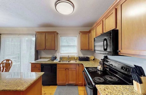 Mills River House | Well-located home in town with sunrise views, deck & great backyard