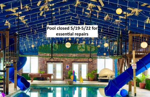 Bryant House | Wood Haven Cabin with a hot tub fire pit & indoor pool