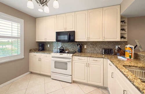 Boca Grande House | Woodwind Beach 11 | Pet Friendly | Beachfront | Community Pool | Sleeps 6