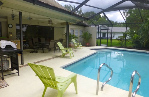 Carrollwood House | WOW - like staying in a park: beautiful lakefront, private heated pool in Tampa!