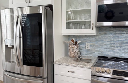 Hobe Sound House | Zephyr House in Zeus Park - Walk to Beach & Dining, Game Room, Screen Patio Boho