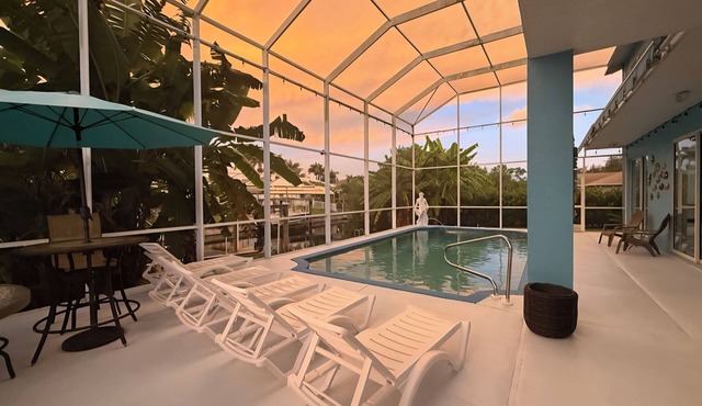 4-bedroom, pool, fishing, games, BBQ, kayak and front water.