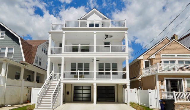 4 houses from beach; Outside pool; Elevator Access; Less than 3 yrs old