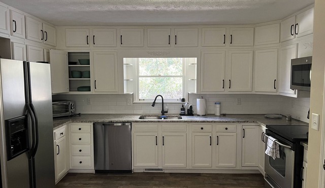 ALL DECKED OUT Secluded Spacious home with POOL Close to the city !