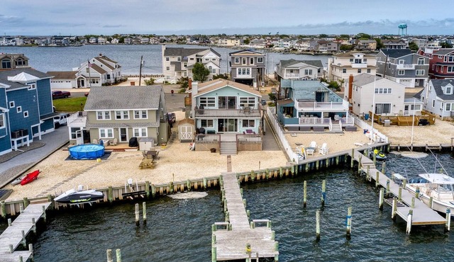Bay Front 2nd floor duplex boasts amazing bay views from both porch and deck.