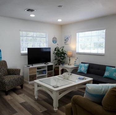 Beach Style lake view home with boat parking & minutes to the best beaches!