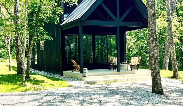 Black Sparrow is a new, perfect, 2-bedroom, 2-bath wooded chalet on private lake