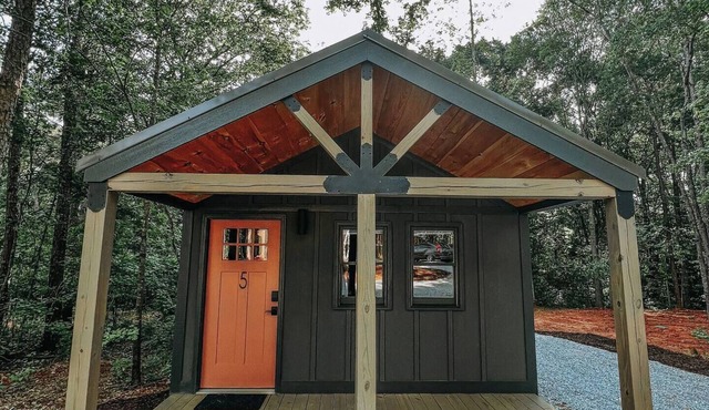 Cabin #5: One bedroom with full kitchen and a large gravel parking pad beside the cabin for easy boat or trailer storage.