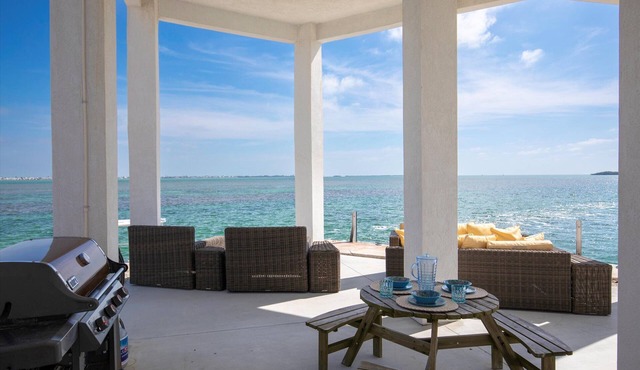 Caribbean Blue #517 Oceanfront Retreat with Dock, Pool & Stunning Views