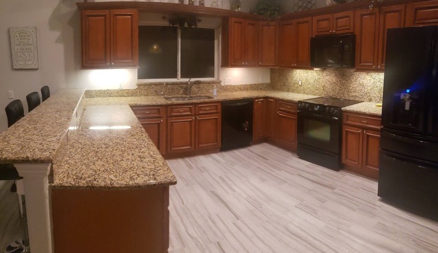 Charming 3-bedroom house with WiFi and fitness room in OrlandonGated community