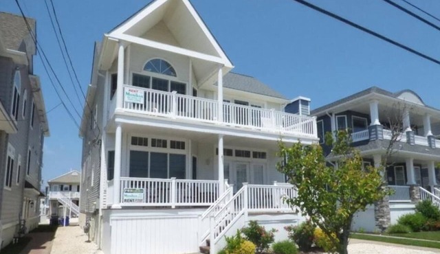 Coastal living from this spacious 4-bedroom, easy walk to sand and surf