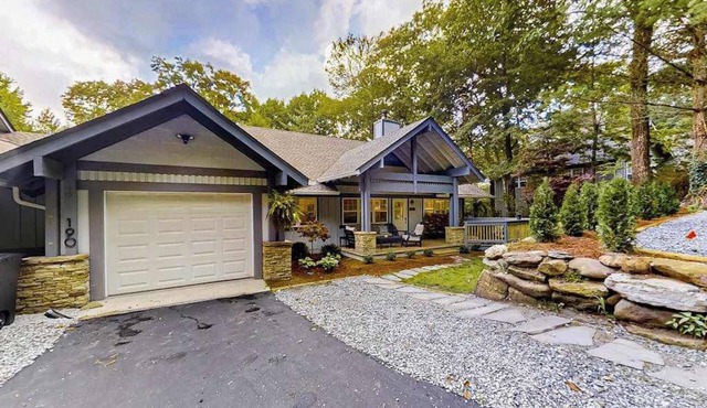 Dog-friendly home with private deck, outdoor fireplace, & immaculate interior