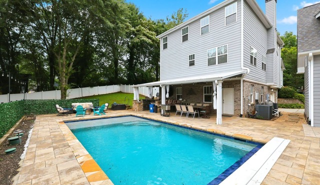 Experience the best of Atlanta living in Grant Park area. This stunning property features a spacious 4BR/4BA main home plus a fully private 1BR/1BA carriage house studio.