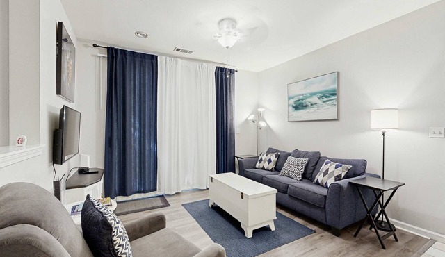 Fully-furnished first-floor condo with pool & private washer/dryer- dog-friendly