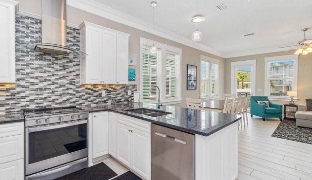 Gulf & canal views with modern amenities, pool, & beach access