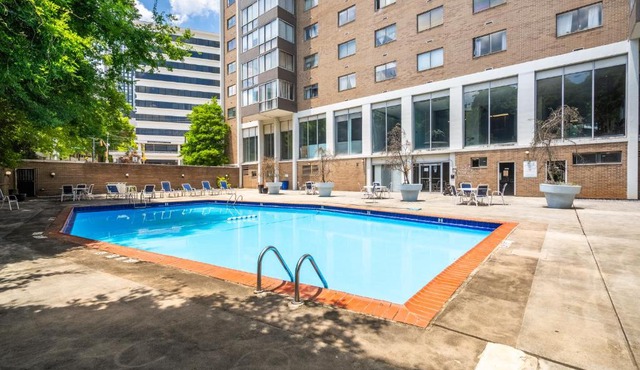 High-rise retreat w pool & views