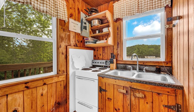 Lake Front 2 Bedroom Cabin,6, With a Pool and Bar & Grill