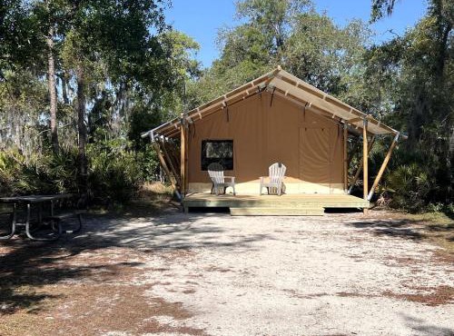 Luxurious Deluxe Safari Tent with King Bed and Outdoor Fire Pit in Bradenton, Florida