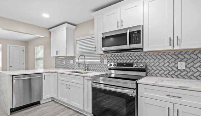 Newly Renovated 3-bedroom house nestled between the airport and uptown.