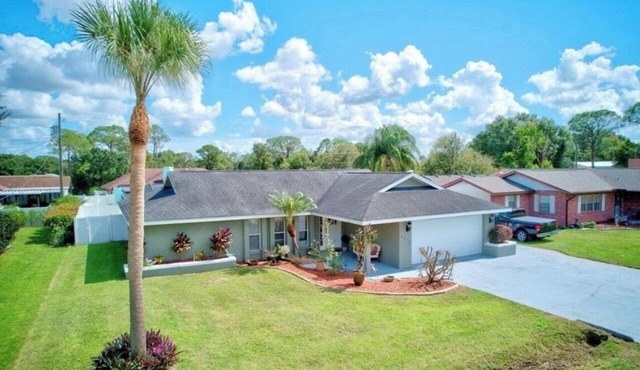 “Peaceful villa with pool, near lakes, shops & highways – perfect getaway”