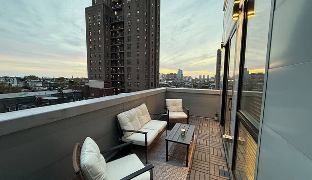 Private Balcony | Gorgeous Center City Bilevel Apt