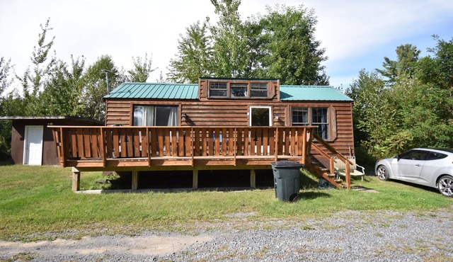Rustic, cozy lodge available for rent at Plattsburgh RV Park