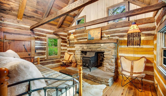 Rustic retreat with wood stove, old-school kitchen, porch, & lovely views