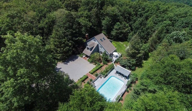 Secluded 4 bedroom home with pool and hot tub on 9 acres